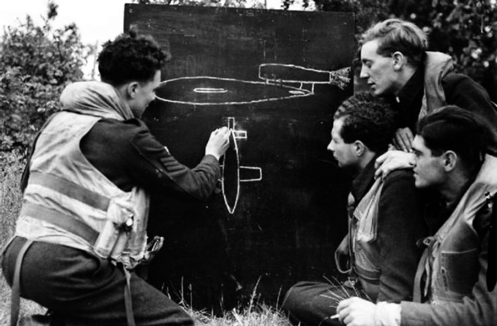 RAF pilots study the features of the VI flying bomb